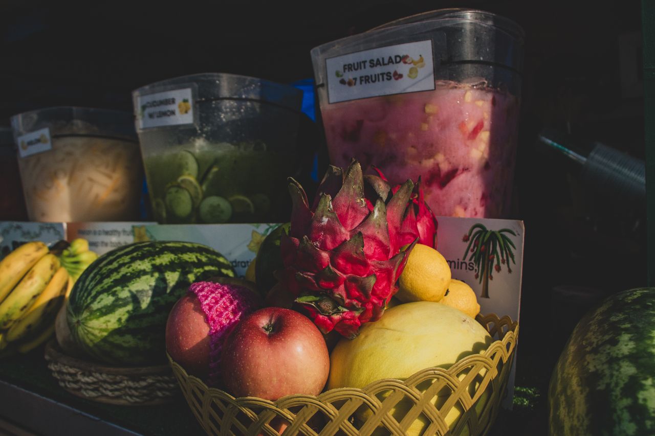 Vibrant display of tropical fruits at a Manila market stall, perfect for culinary and travel themes.
